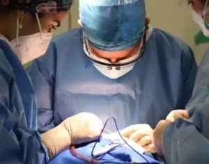 Surgeon performing an operation in the operating room
