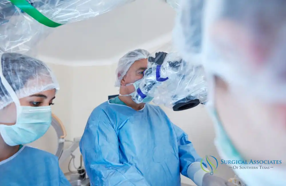 Surgical team in an operating room during a minimally invasive procedure